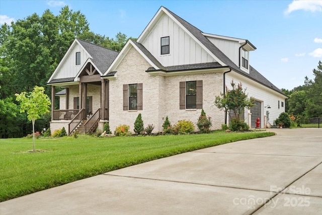 867 Bellegray Rd, Clover, SC 29710 - view of front facade featuring board and batten siding, driveway, a front yard, covered porch, and a shingled roof