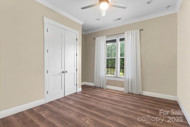 867 Bellegray Rd, Clover, SC 29710 - unfurnished bedroom featuring ornamental molding, wood finished floors, a closet, and a ceiling fan