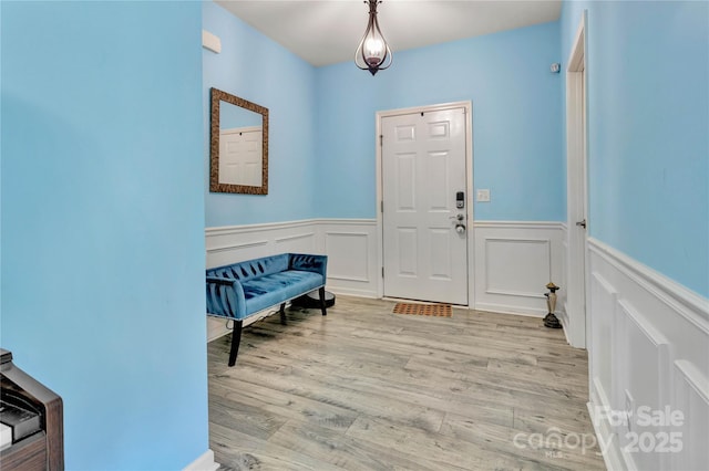 1017 Quail Run Ct, Indian Land, SC 29707 - foyer entrance with wainscoting, wood finished floors, and a decorative wall