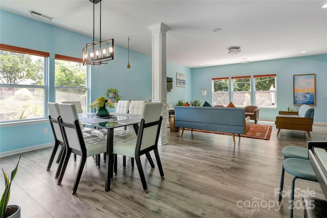 1017 Quail Run Ct, Indian Land, SC 29707 - dining space with wood finished floors, a chandelier, and baseboards