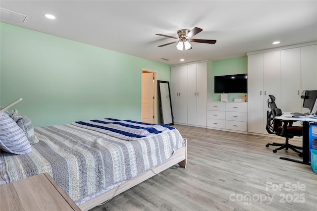 1017 Quail Run Ct, Indian Land, SC 29707 - bedroom with two closets, light wood finished floors, an office area, ceiling fan, and recessed lighting