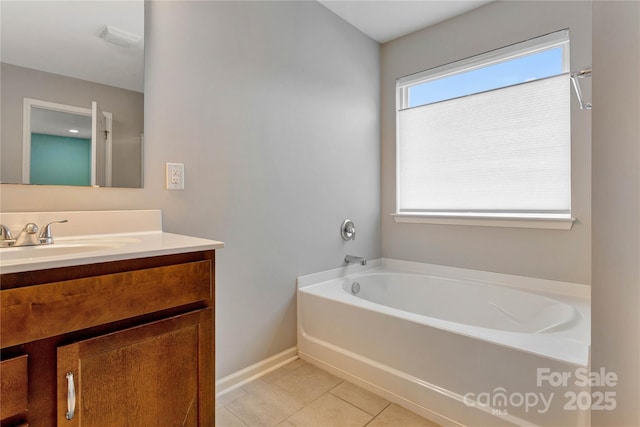 1017 Quail Run Ct, Indian Land, SC 29707 - full bathroom featuring a bath, vanity, baseboards, and tile patterned flooring