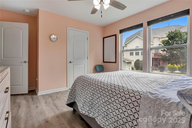 1017 Quail Run Ct, Indian Land, SC 29707 - bedroom featuring light wood-type flooring, baseboards, and a ceiling fan