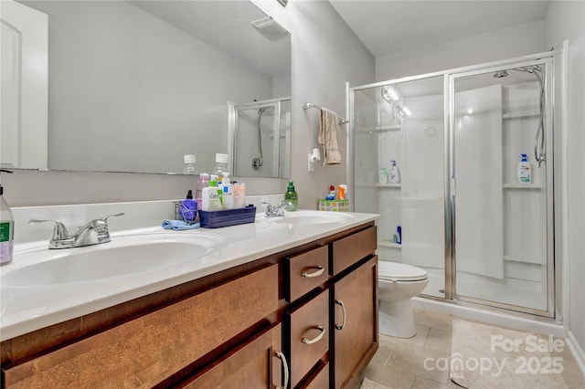1017 Quail Run Ct, Indian Land, SC 29707 - full bath featuring a shower stall, tile patterned flooring, double vanity, and toilet