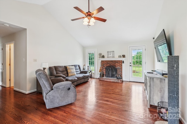 4527 Marshall Ct, Monroe, NC 28110 - living room featuring wood finished floors, high vaulted ceiling, ceiling fan, and a brick fireplace