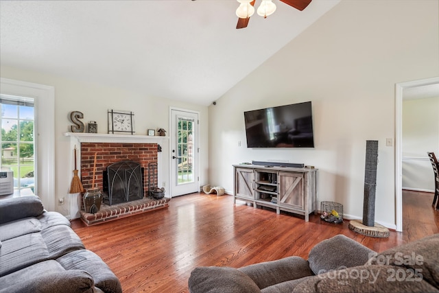 4527 Marshall Ct, Monroe, NC 28110 - living area with a ceiling fan, high vaulted ceiling, a fireplace, and wood finished floors