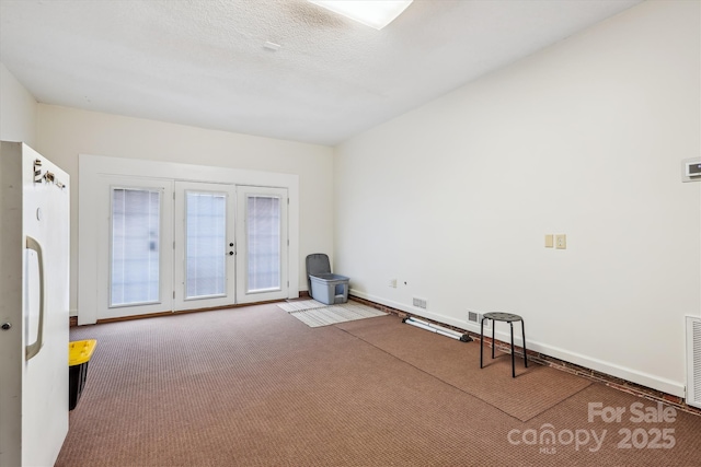 4527 Marshall Ct, Monroe, NC 28110 - unfurnished room with french doors, carpet floors, and baseboards