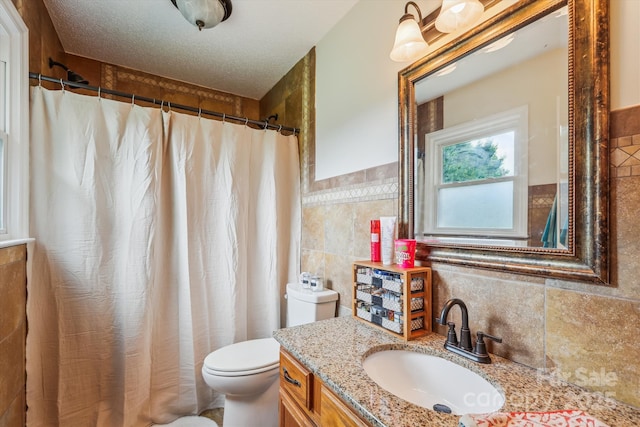 4527 Marshall Ct, Monroe, NC 28110 - full bath featuring tile walls, vanity, toilet, and a shower with curtain