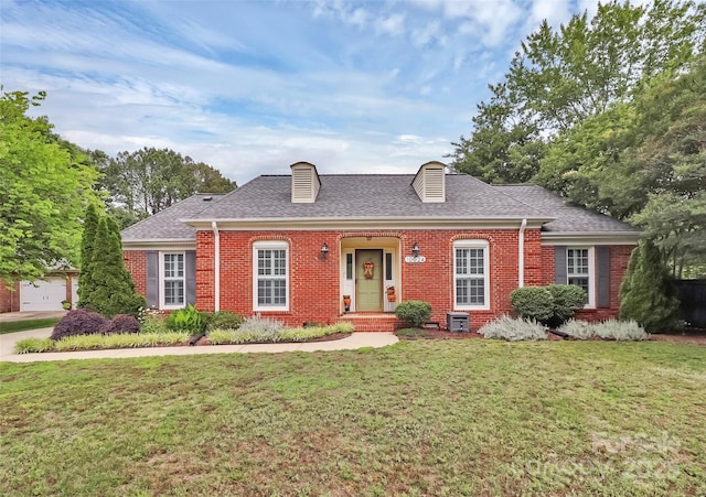 10024 Tealridge Ln, Charlotte, NC 28277 - view of front facade with brick siding, a front lawn, and roof with shingles