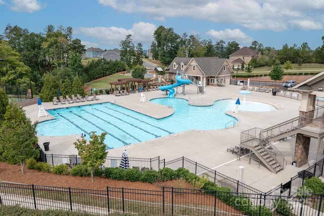 14611 Murfield Ct, Charlotte, NC 28278 - community pool featuring a water slide and a patio