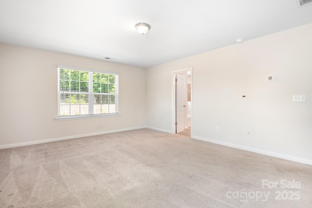 14611 Murfield Ct, Charlotte, NC 28278 - spare room with light colored carpet, baseboards, and a smoke detector
