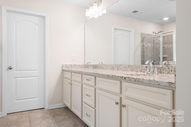 14611 Murfield Ct, Charlotte, NC 28278 - full bathroom with double vanity, a stall shower, baseboards, and recessed lighting