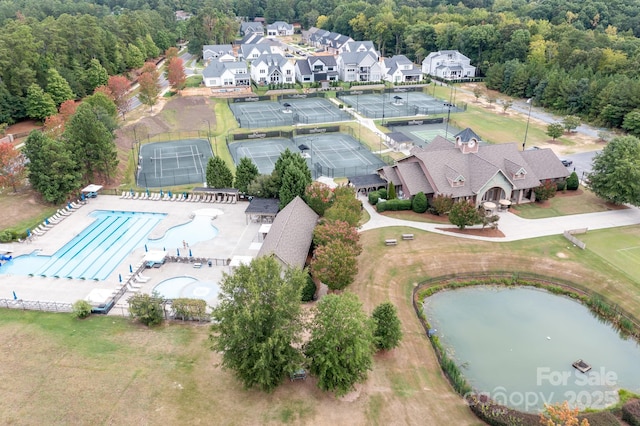 14611 Murfield Ct, Charlotte, NC 28278 - aerial perspective of suburban area with a pool area and a forest
