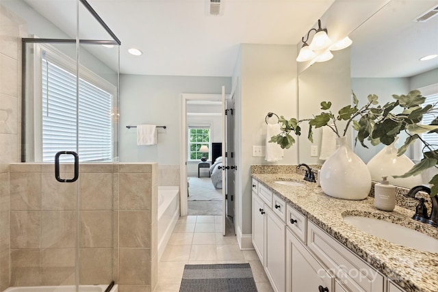 2844 Georgia Ave, Charlotte, NC 28205 - bathroom with double vanity, a garden tub, a shower stall, and connected bathroom