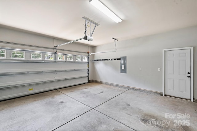 2844 Georgia Ave, Charlotte, NC 28205 - garage with electric panel and a garage door opener