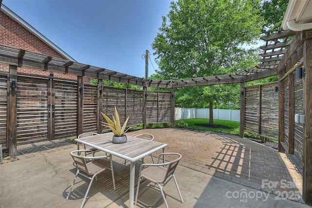 2844 Georgia Ave, Charlotte, NC 28205 - fenced backyard with a pergola, outdoor dining area, and a patio