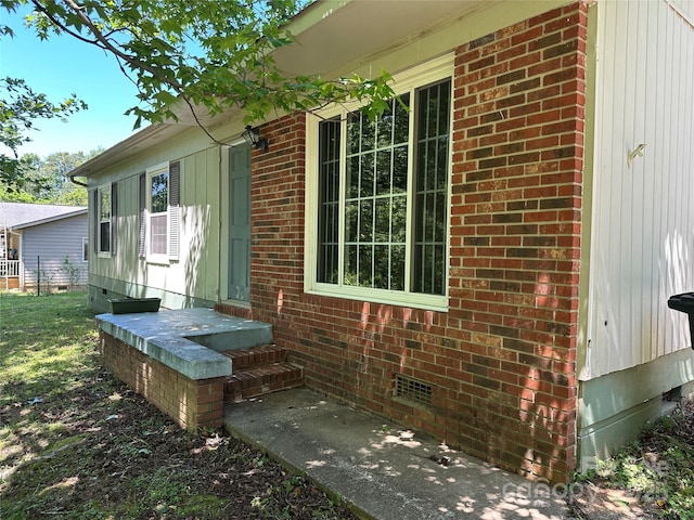 488 John Swofford Rd, Nebo, NC 28761 - exterior space featuring crawl space and brick siding