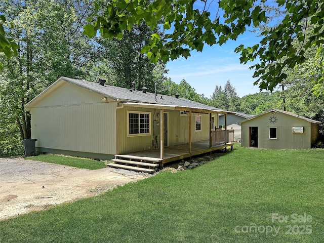 488 John Swofford Rd, Nebo, NC 28761 - rear view of property with a wooden deck and a yard