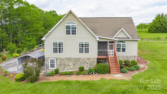 3690 Penland Rd, Spruce Pine, NC 28777 - view of front of property with a sunroom, stone siding, stairway, a front lawn, and a shingled roof