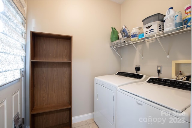 3690 Penland Rd, Spruce Pine, NC 28777 - laundry room with separate washer and dryer, light tile patterned flooring, and baseboards
