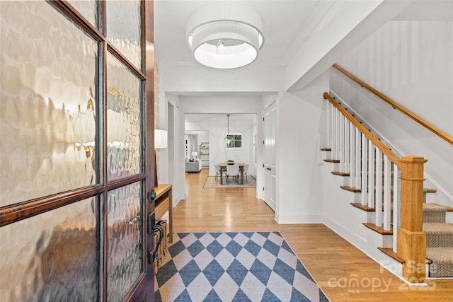 6013 Camile Ct, Charlotte, NC 28226 - entryway featuring wood finished floors and stairs