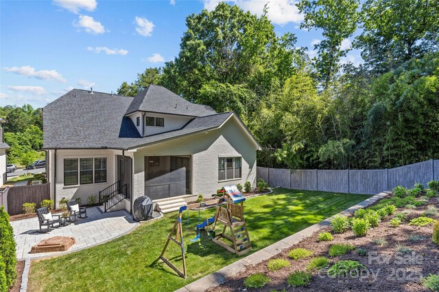 6013 Camile Ct, Charlotte, NC 28226 - rear view of property featuring entry steps and a patio area