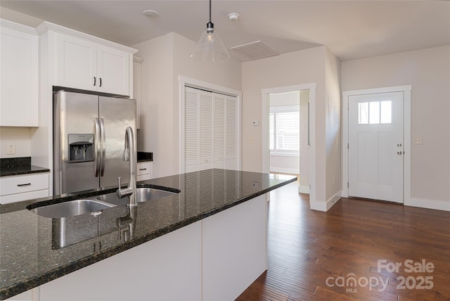 82 Wheeler Rd, Weaverville, NC 28787 - kitchen with stainless steel refrigerator with ice dispenser, a sink, white cabinetry, dark wood-style floors, and hanging light fixtures