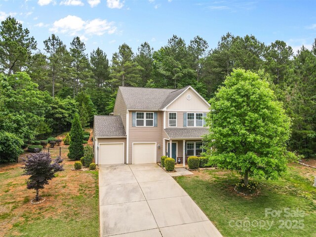 6010 Hawk View Rd, Waxhaw, NC 28173 - traditional home featuring driveway, roof with shingles, and covered porch
