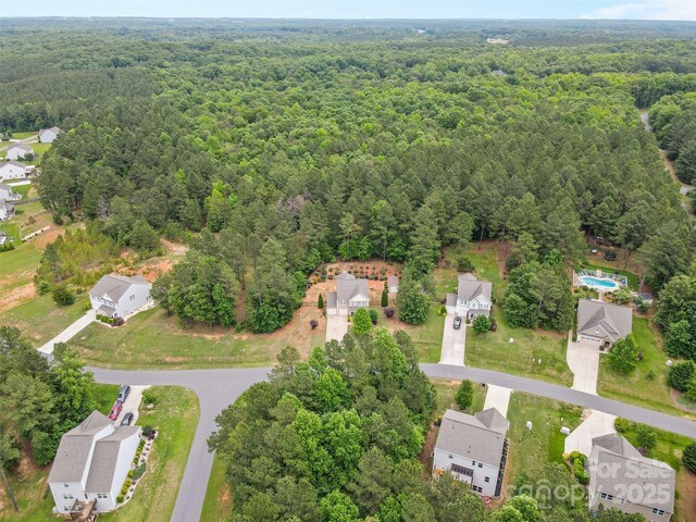 6010 Hawk View Rd, Waxhaw, NC 28173 - aerial overview of property's location with a heavily wooded area and nearby suburban area
