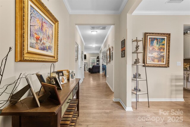 6010 Hawk View Rd, Waxhaw, NC 28173 - corridor featuring light wood-style floors, baseboards, and ornamental molding