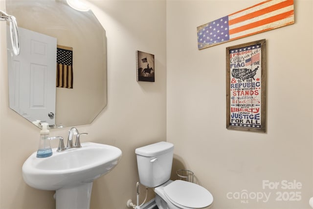 6010 Hawk View Rd, Waxhaw, NC 28173 - bathroom with toilet and a sink