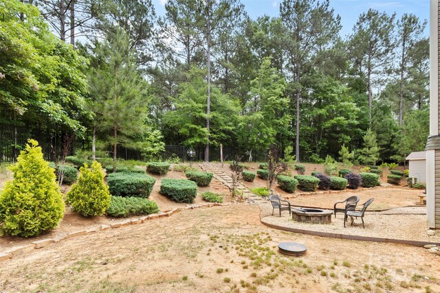 6010 Hawk View Rd, Waxhaw, NC 28173 - view of yard featuring an outdoor fire pit and view of scattered trees