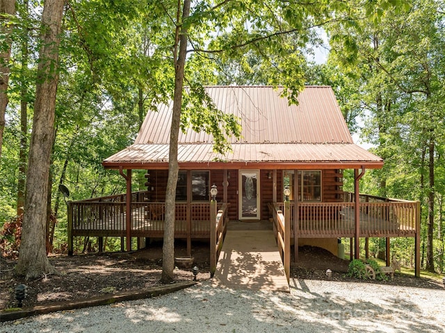 79 Acorn Ln, Rutherfordton, NC 28139 - view of front of home with metal roof, a deck, and log exterior