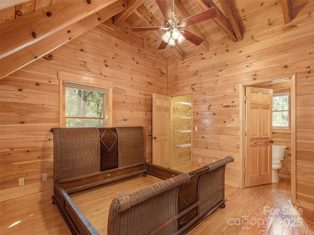 79 Acorn Ln, Rutherfordton, NC 28139 - unfurnished bedroom featuring wood walls, ensuite bathroom, light wood-style flooring, and wood ceiling