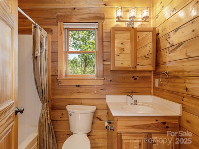 79 Acorn Ln, Rutherfordton, NC 28139 - full bathroom featuring vanity, wooden walls, toilet, and shower / bath combo