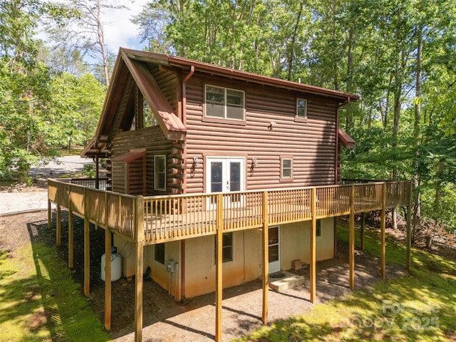 79 Acorn Ln, Rutherfordton, NC 28139 - rear view of property with french doors, a deck, and log siding