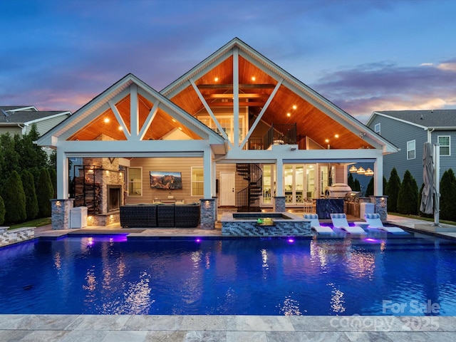 4049 Shadowbrook Rd, Waxhaw, NC 28173 - pool at dusk featuring area for grilling, an outdoor hangout area, stairs, and an outdoor pool