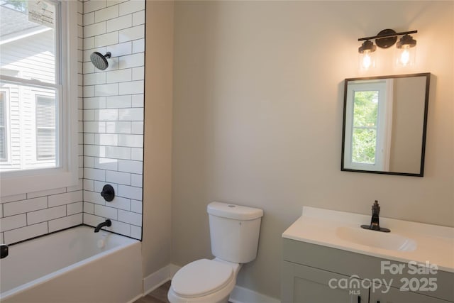 112 Hampton St, Chester, SC 29706 - bathroom featuring vanity, toilet, shower / bathtub combination, and baseboards