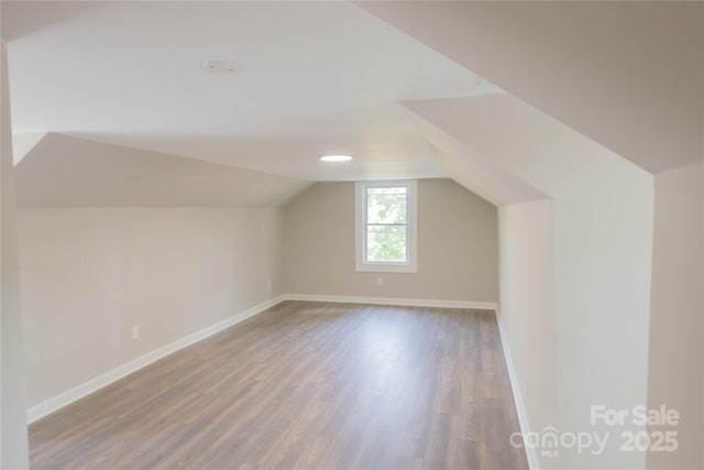 112 Hampton St, Chester, SC 29706 - bonus room with wood finished floors, vaulted ceiling, and baseboards