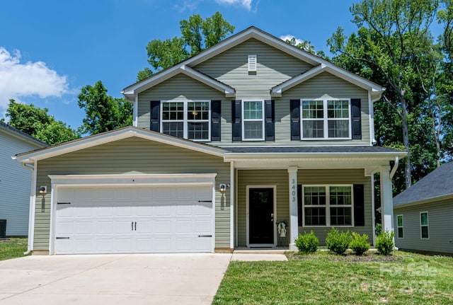 3403 Keith Dr, Charlotte, NC 28269 - traditional-style home with driveway, covered porch, a front lawn, and central air condition unit