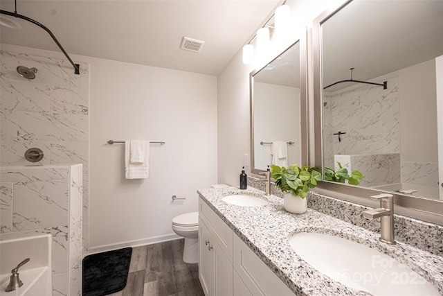 3403 Keith Dr, Charlotte, NC 28269 - full bath with a marble finish shower, double vanity, a bathtub, and wood finished floors