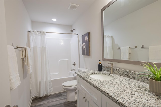 3403 Keith Dr, Charlotte, NC 28269 - full bath with toilet, vanity, shower / tub combo with curtain, wood finished floors, and recessed lighting