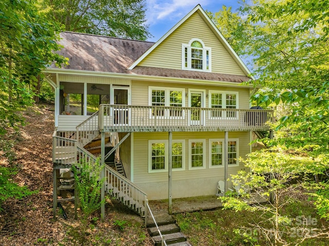 333 Lentz Landing Ln, Nebo, NC 28761 - view of front facade with stairs, a ceiling fan, a shingled roof, and a sunroom