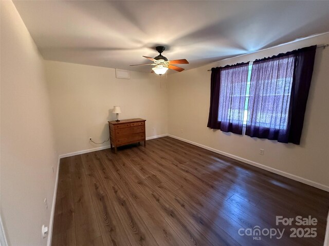 333 Lentz Landing Ln, Nebo, NC 28761 - unfurnished room with dark wood finished floors and ceiling fan