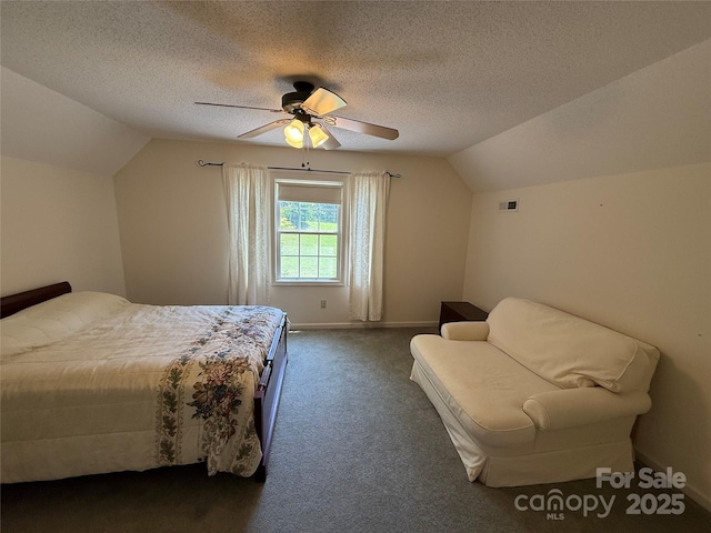 333 Lentz Landing Ln, Nebo, NC 28761 - bedroom featuring vaulted ceiling, dark carpet, a ceiling fan, and a textured ceiling