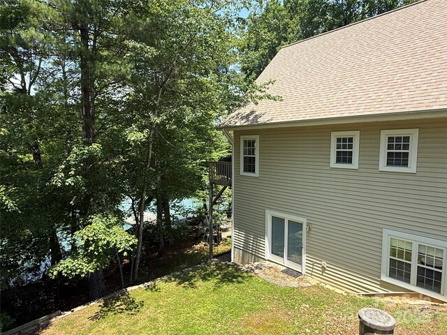 333 Lentz Landing Ln, Nebo, NC 28761 - view of side of home with a yard and roof with shingles