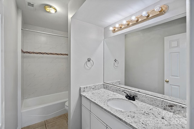 409 W 8th St Unit B, Charlotte, NC 28202 - bathroom featuring vanity, tile patterned floors, toilet, and washtub / shower combination