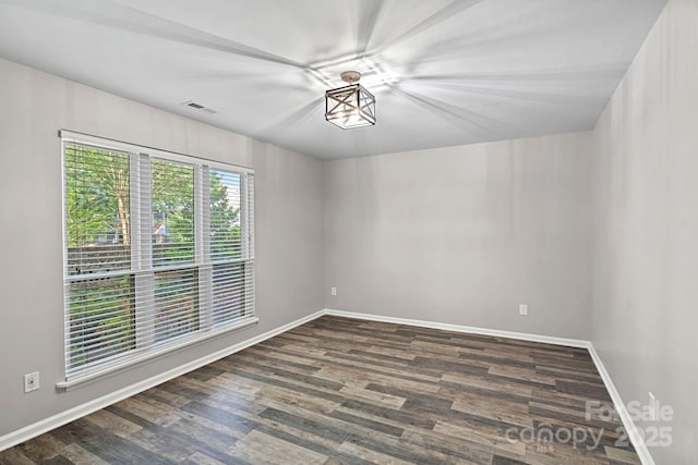 409 W 8th St Unit B, Charlotte, NC 28202 - spare room featuring wood finished floors and baseboards