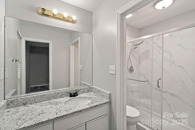 409 W 8th St Unit B, Charlotte, NC 28202 - bathroom with vanity, toilet, and a marble finish shower