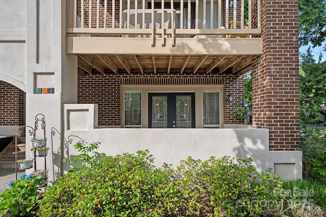 409 W 8th St Unit B, Charlotte, NC 28202 - property entrance with a balcony and brick siding